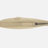 A small beige leather zip pouch with a silver zipper, shown in profile against a light gray background.